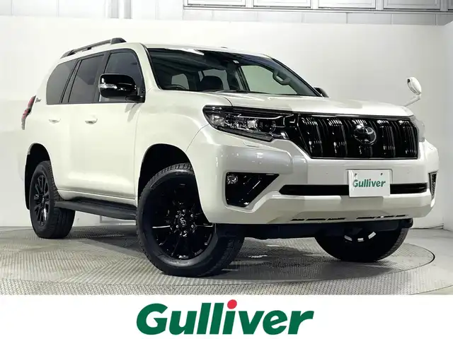 トヨタ ランドクルーザー プラド TX-L 70thアニバーサリーLTD 大阪府 2022(令4)年 1.2万km ホワイトパールクリスタルシャイン サンルーフ 茶革シート 10V型有機ELディスプレイナビTV バックカメラ パワーシート/ヒーター/エアコン レーダークルコン 衝突軽減ブレーキ レーンアシスト オートハイビーム ルーフレール ４WD