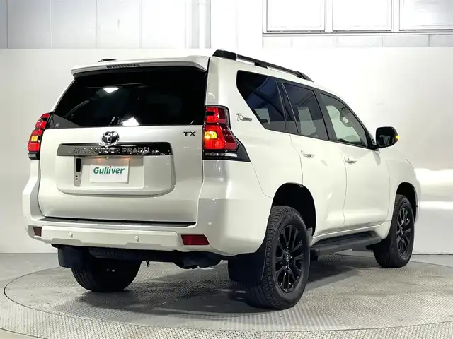 トヨタ ランドクルーザー プラド TX-L 70thアニバーサリーLTD 大阪府 2022(令4)年 1.2万km ホワイトパールクリスタルシャイン サンルーフ 茶革シート 10V型有機ELディスプレイナビTV バックカメラ パワーシート/ヒーター/エアコン レーダークルコン 衝突軽減ブレーキ レーンアシスト オートハイビーム ルーフレール ４WD