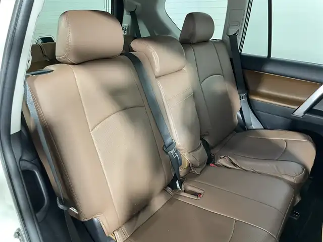 トヨタ ランドクルーザー プラド TX-L 70thアニバーサリーLTD 大阪府 2022(令4)年 1.2万km ホワイトパールクリスタルシャイン サンルーフ 茶革シート 10V型有機ELディスプレイナビTV バックカメラ パワーシート/ヒーター/エアコン レーダークルコン 衝突軽減ブレーキ レーンアシスト オートハイビーム ルーフレール ４WD