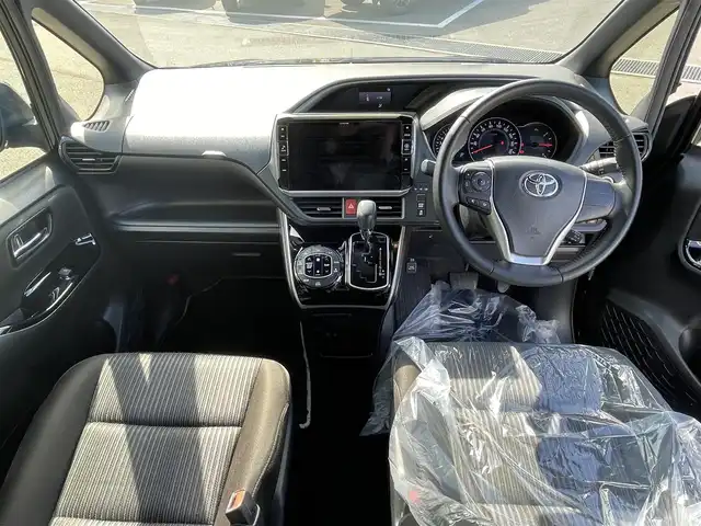 トヨタ ヴォクシー ZS 煌Ⅱ 愛媛県 2020(令2)年 5万km ブラック アルパイン製ナビ（Bluetooth/フルセグTV/DVD再生）/ビルトインETC/両側パワースライドドア/クルーズコントロール/前後ドライブレコーダー/バックドアイージークローザー/バックカメラ/3列シート/ウォークスルー/純正アルミホイール/純正フロアマット/LEDヘッドライト