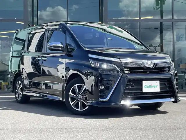 トヨタ ヴォクシー ZS 煌Ⅱ 愛媛県 2020(令2)年 5万km ブラック アルパイン製ナビ（Bluetooth/フルセグTV/DVD再生）/ビルトインETC/両側パワースライドドア/クルーズコントロール/前後ドライブレコーダー/バックドアイージークローザー/バックカメラ/3列シート/ウォークスルー/純正アルミホイール/純正フロアマット/LEDヘッドライト