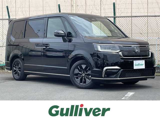 ホンダ ステップワゴン スパーダ 東京都 2024(令6)年 1万km クリスタルブラックパール 純正ナビ/バックモニター/衝突軽減ブレーキ/路外逸脱抑制/ブラインドスポット/パーキングセンサー/レーダークルーズ/シートヒーター/両側電動スライドドア/電動リアゲート/ETC/ステアリングスイッチ
