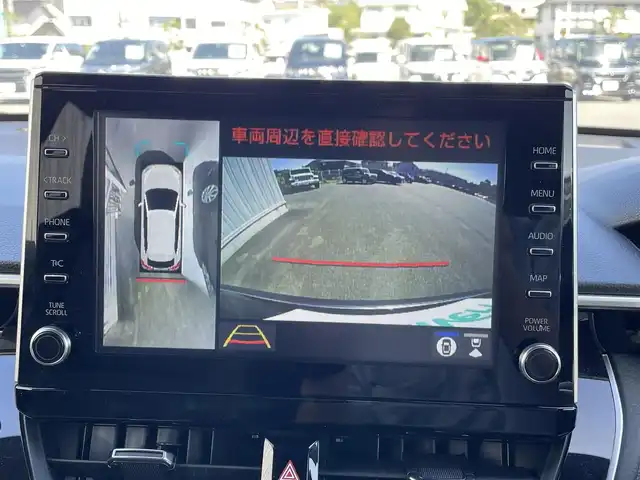 トヨタ カローラ クロス ハイブリッド Z 岡山県 2023(令5)年 3.1万km アティチュードブラックマイカ 純正9インチディスプレイオーディオ/AM、FM、Bluetooth、AppleCarplay/AndroidAuto/パノラミックビューモニター/ビルトインETC/パワーバックドア/前後ドライブレコーダー　DC-DR652/前席シートヒーター/ハーフレザーシート/トヨタセーフティセンス/・プリクラッシュセーフティ/・オートマチックハイビーム/・ロードサインアシスト/・レーントレーシングアシスト/・レーダークルーズコントロール/・先行車発進告知機能/・ブラインドスポットモニター/・パーキングサポートブレーキ/ブレーキホールド/電動パーキングブレーキ