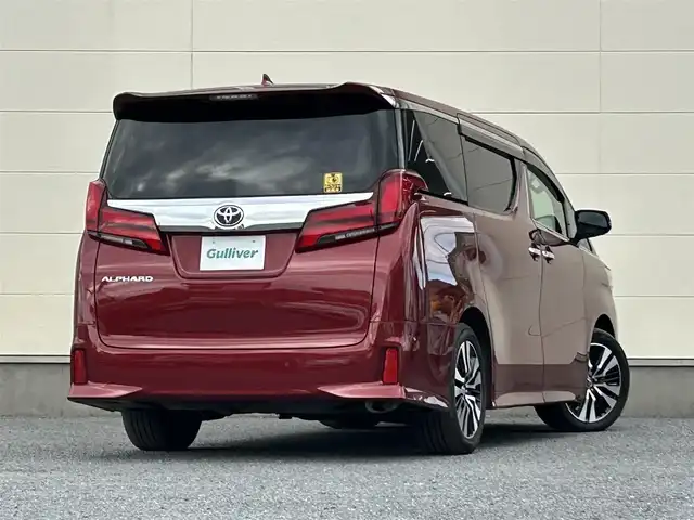 トヨタ アルファード S Cパッケージ 茨城県 2020(令2)年 10.8万km ダークレッドマイカメタリック 純正ディスプレイオーディオ【ナビ機能付】/(FM/AM/TV/Bluetooth/Miracast)/フリップダウンモニター/パノラミックビューモニター/トヨタセーフティセンス/・衝突軽減ブレーキ/・レーンキープアシスト/・レーダークルーズコントロール/・オートマチックハイビーム/・クリアランスソナー/・ブラインドスポットモニター/JBLオーディオ/ETC2.0/快適温熱シート/オットマン/パワーシート/ドライブレコーダー（前後）/ステアリングヒーター/パワーバックドア/リアサンシェード/純正アルミホイール