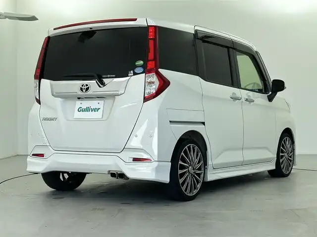 トヨタ ルーミー カスタムG－T 福井県 2018(平30)年 5万km パールホワイトⅢ モデリスタエアロ/9インチナビ/(フルセグTV/BT/CD/DVD)/バックカメラ/衝突被害軽減システム/コーナーセンサー/クルーズコントロール/両側パワースライドドア/横滑り防止装置/LEDヘッドライト/フォグランプ/オートライト/電動格納ミラー/プッシュスタート/スマートキー