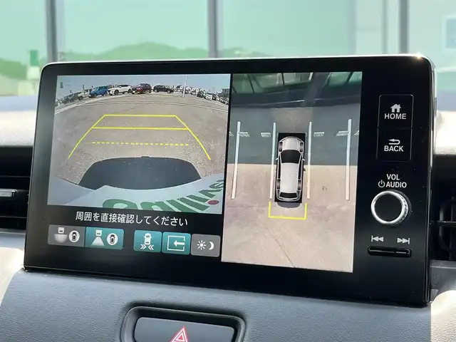 ホンダ ヴェゼル ハイブリッド e:HEV Z 香川県 2022(令4)年 2.1万km プラチナホワイトパール Honda SENSING/純正9インチワイドディスプレイナビ/　AM FM Bluetooth AppleCarPlay AndroidAuto/フルセグTV/ビルトインETC2.0/レーダークルーズコントロール/全方位カメラ/ドライブレコーダー/置くだけ充電/BSM/LEDオートヘッドライト/シーケンシャルターンランプ/デジタルインナーミラー/ハーフレザーシート/シートヒーター(前席)/パワーバックドア/純正18インチアルミホイール/スマートキー2本/ワンオーナー