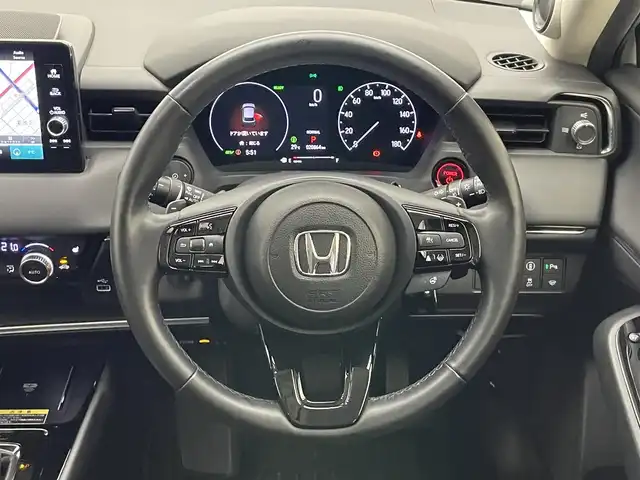 ホンダ ヴェゼル ハイブリッド e:HEV Z 愛知県 2022(令4)年 2.1万km プラチナホワイトパール Honda SENSING/純正9インチワイドディスプレイナビ/　AM FM Bluetooth AppleCarPlay AndroidAuto/フルセグTV/ビルトインETC2.0/レーダークルーズコントロール/全方位カメラ/ドライブレコーダー/置くだけ充電/BSM/LEDオートヘッドライト/シーケンシャルターンランプ/デジタルインナーミラー/ハーフレザーシート/シートヒーター(前席)/パワーバックドア/純正18インチアルミホイール/スマートキー2本/ワンオーナー