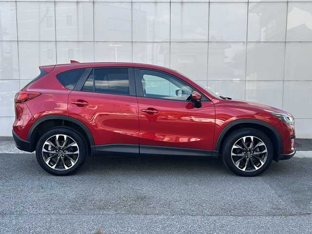 マツダ ＣＸ－５ XD Lパッケージ 埼玉県 2015(平27)年 9万km ソウルレッドプレミアムメタリック (株)IDOMが運営する【じしゃロン熊谷店】の自社ローン専用車両になりますこちらは現金またはオートローンご利用時の価格です。自社ローンご希望の方は別途その旨お申付け下さい/純正ナビ/　（フルセグTV/Bluetooth/AM/FM/CD）/バックカメラ/ETC/ブラインドスポットモニター/レーダークルーズコントロール/前席パワーシート/前席シートヒーター/レザーシート/純正19インチアルミホイール/アイドリングストップ/スマートキー/プッシュスタート/ステアリングリモコン/純正フロアマット/車両取扱説明書