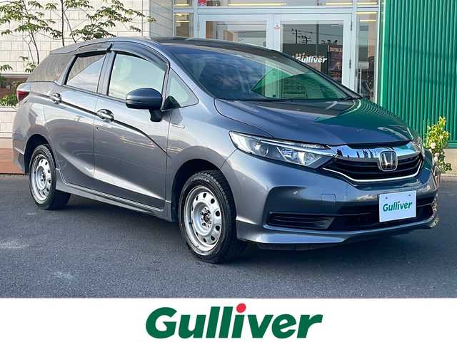 ホンダ シャトル ハイブリッド ホンダセンシング 青森県 2020(令2)年 11.7万km シャイニンググレーM 4WD/純正SDナビ/バックカメラ/衝突軽減ブレーキ/追従クルーズコントロール/誤発進抑制機能/レーンキープアシスト/前方ドライブレコーダー/ビルトインETC/ワイパーデアイサー/プッシュスタート/スマートキー