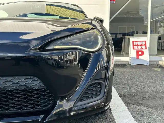 トヨタ ８６ GT 京都府 2012(平24)年 9.1万km クリスタルブラックシリカ (株)IDOMが運営する【じしゃロン伏見店】の自社ローン専用車両になりますこちらは現金またはオートローンご利用時の価格です。自社ローンご希望の方は別途その旨お申付け下さい/純正ナビ　/ＥＴＣ/Ｂカメラ/ＢＴ／ＤＶＤ／ＣＤ/純正１７インチＡＷ