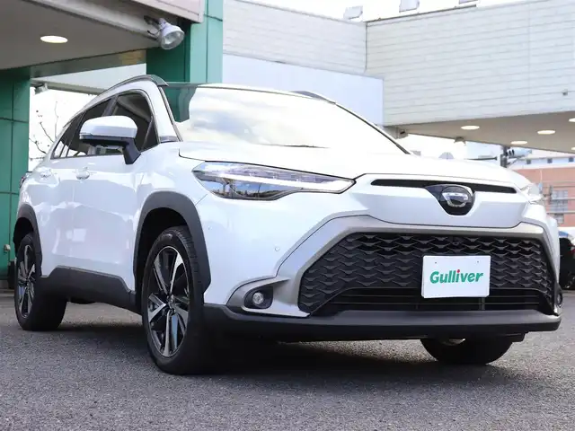 トヨタ カローラ クロス ハイブリッド Z 神奈川県 2024(令6)年 1.8万km プラチナホワイトパールマイカ ワンオーナー/ディスプレイオーディオプラス/純正メモリナビ/全方位カメラ/フルセグテレビ/パノラマルーフ/レーダークルーズ/プリクラッシュセーフティ/トヨタチームメイト/ブラインドスポットモニター/ステアリングヒーター/パワーバックドア/置くだけ充電/ETC2.0/エンジンプッシュスタート/保証書/取説/スペアスマートキー