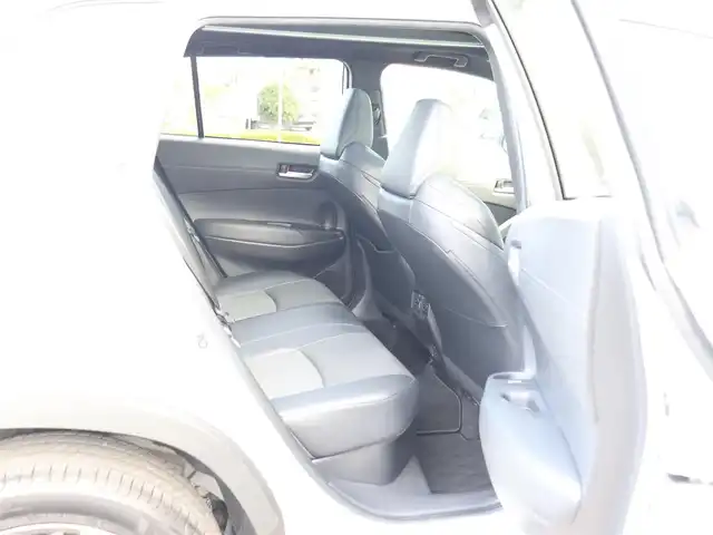 トヨタ カローラ クロス ハイブリッド Z 神奈川県 2024(令6)年 1.8万km プラチナホワイトパールマイカ ワンオーナー/ディスプレイオーディオプラス/純正メモリナビ/全方位カメラ/フルセグテレビ/パノラマルーフ/レーダークルーズ/プリクラッシュセーフティ/トヨタチームメイト/ブラインドスポットモニター/ステアリングヒーター/パワーバックドア/置くだけ充電/ETC2.0/エンジンプッシュスタート/保証書/取説/スペアスマートキー