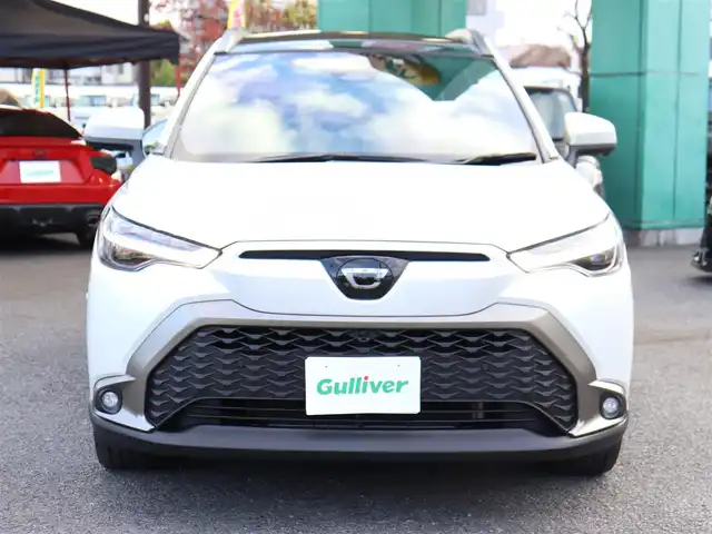 トヨタ カローラ クロス ハイブリッド Z 神奈川県 2024(令6)年 1.8万km プラチナホワイトパールマイカ ワンオーナー/ディスプレイオーディオプラス/純正メモリナビ/全方位カメラ/フルセグテレビ/パノラマルーフ/レーダークルーズ/プリクラッシュセーフティ/トヨタチームメイト/ブラインドスポットモニター/ステアリングヒーター/パワーバックドア/置くだけ充電/ETC2.0/エンジンプッシュスタート/保証書/取説/スペアスマートキー