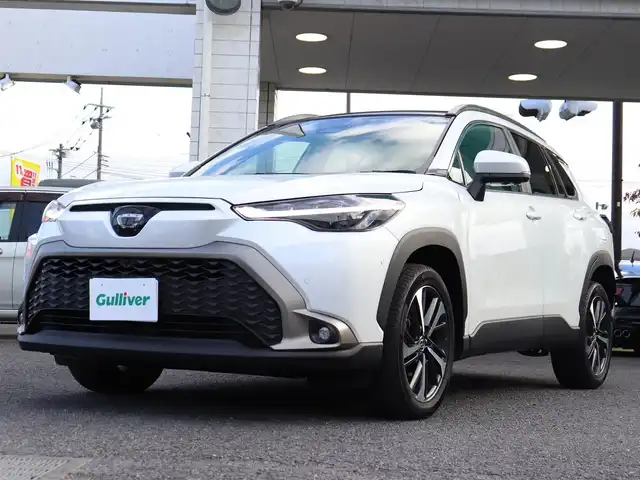 トヨタ カローラ クロス ハイブリッド Z 神奈川県 2024(令6)年 1.8万km プラチナホワイトパールマイカ ワンオーナー/ディスプレイオーディオプラス/純正メモリナビ/全方位カメラ/フルセグテレビ/パノラマルーフ/レーダークルーズ/プリクラッシュセーフティ/トヨタチームメイト/ブラインドスポットモニター/ステアリングヒーター/パワーバックドア/置くだけ充電/ETC2.0/エンジンプッシュスタート/保証書/取説/スペアスマートキー