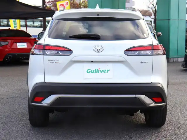 トヨタ カローラ クロス ハイブリッド Z 神奈川県 2024(令6)年 1.8万km プラチナホワイトパールマイカ ワンオーナー/ディスプレイオーディオプラス/純正メモリナビ/全方位カメラ/フルセグテレビ/パノラマルーフ/レーダークルーズ/プリクラッシュセーフティ/トヨタチームメイト/ブラインドスポットモニター/ステアリングヒーター/パワーバックドア/置くだけ充電/ETC2.0/エンジンプッシュスタート/保証書/取説/スペアスマートキー