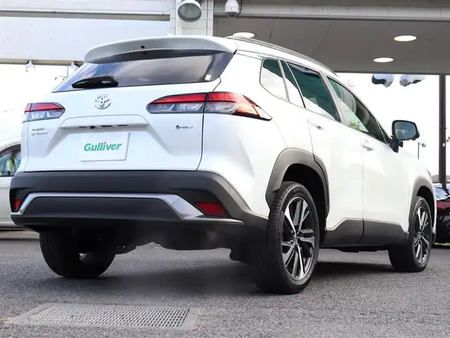 トヨタ カローラ クロス ハイブリッド Z 神奈川県 2024(令6)年 1.8万km プラチナホワイトパールマイカ ワンオーナー/ディスプレイオーディオプラス/純正メモリナビ/全方位カメラ/フルセグテレビ/パノラマルーフ/レーダークルーズ/プリクラッシュセーフティ/トヨタチームメイト/ブラインドスポットモニター/ステアリングヒーター/パワーバックドア/置くだけ充電/ETC2.0/エンジンプッシュスタート/保証書/取説/スペアスマートキー