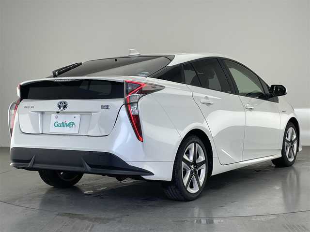 トヨタ プリウス S ツーリングセレクション 鳥取県 2016(平28)年 5.4万km ホワイトパールクリスタルシャイン 純正９型ナビ　フルセグＴＶ　Ｂｌｕｅｔｏｏｔｈ　黒合皮　シートヒーター　バックカメラ　ＥＴＣ　セーフティセンス　衝突軽減　追従クルコン　ＬＥＤライト　オートライト　フォグランプ　社外ＡＷ4本積込　保証書　取説　ワンオナ　禁煙車