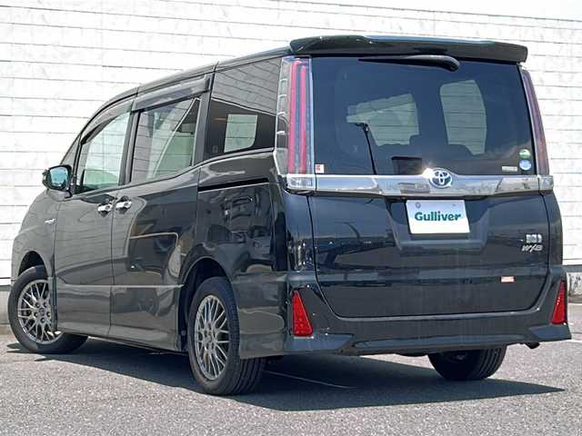 トヨタ ノア ハイブリッド Si ダブルバイビー 茨城県 2018(平30)年 4.1万km ブラック ワンオーナー/純正メモリナビ【NSZN-W66T】/(フルセグTV・CD・DVD・BT・ラジオ再生)/両側パワースライドドア/クルーズコントロール/衝突軽減ブレーキ/コーナーセンサー/ハーフレザーシート/シートヒーター/ドライブレコーダー/ETC/バックカメラ/オートライト/LEDヘッドライト/純正16inアルミホイール/純正フロアマット/スマートキー/スペアキー/取扱説明書/保証書