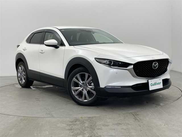 マツダ ＣＸ－３０ XD プロアクティブツーリングセレクション 富山県 2019(令1)年 2.7万km スノーフレイクホワイトパールマイカ 純正ナビ（AM/FM/DVD/BT/USB/HDMI/フルセグ）/全方位カメラ/ドライブレコーダー/ETC/ヘッドアップディスプレイ/ブラインドスポットモニター/衝突被害軽減システム/レーダークルーズコントロール/レーンキープアシスト/コーナーセンサー/横滑り防止装置/アイドリングストップ/D席パワーシート/D席メモリシート/シートヒーター/ハンドルヒーター/オートLEDライト/純正アルミホイール/純正フロアマット/オートホールド付電子パーキング/パワーバックドア/革巻きステアリング/ステアリングスイッチ/パドルシフト/スマートキー/スペアキー
