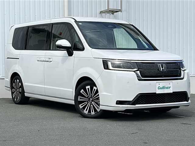 ホンダ ステップワゴン スパーダ eHEV プレミアムライン 三重県 2024(令6)年 0.1万km プラチナホワイトパール 両側パワースライドドア /BSM/ホンダセンシング /1.2列目シートヒーター /前後コーナーセンサー /USB給電 /レーダークルーズコントロール /LEDヘッドライト /オートライト /ハーフレザーシート /オットマン/ウィンカーミラー/電動格納ミラー /禁煙車