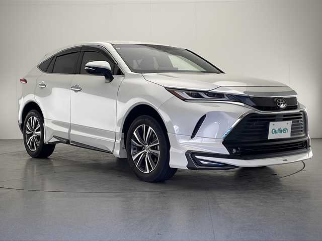 トヨタ ハリアー G 宮崎県 2022(令4)年 0.4万km ホワイトパールクリスタルシャイン Toyota Safety Sense/〇プリクラシュセーフティ/〇レーントレーシングアシスト/〇パーキングサポートブレーキ/〇ロードサインアシスト/〇オートマチックハイビーム/〇クリアランスソナー/〇レーダークルーズコントロール/〇先行車発進告知/モデリスタエアロ/デジタルインナーミラー/純正8インチディスプレイオーディオ/バックカメラ/ハーフレザーシート/パワーシート/パワーバックドア/LEDヘッドライト/純正18インチAW/ビルトインETC/保証書/取扱説明書