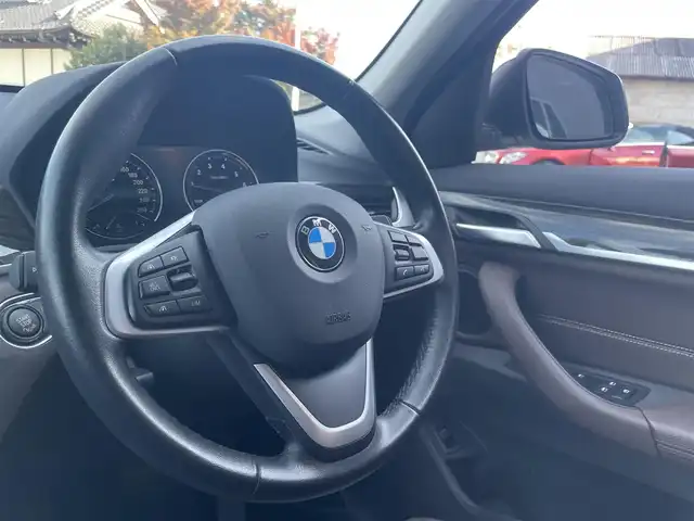ＢＭＷ Ｘ１ xDrive 20i xライン ハイラインパッケージ 栃木県 2019(平31)年 5万km ミネラルホワイト アドバンスドアクティブセーフティパッケージ/├ヘッドアップディスプレイ/└アクティブクルーズコントロール/ハイラインパッケージ/├茶革シート/└パワーシート/インテリジェントセーフティ/コンフォートアクセス/ナビ/バックカメラ/ミラーETC/パークディスタンスコントロール/LEDヘッドライト/オートライト/パワーテールゲート