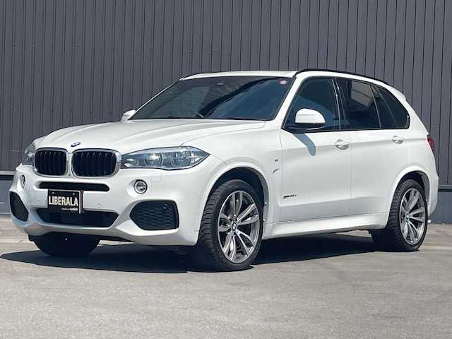 ＢＭＷ Ｘ５ xDrive 35d Mスポーツ 青森県 2016(平28)年 6.3万km アルピンホワイトⅢ ・4WD/・ディーゼル/ターボ/・サンルーフ/・メーカーHDDナビ/(Bluetooth/FM/AM/USB)/・全方位カメラ/・レーダークルーズコントロール/・ダウンヒルアシスト/・インテリジェントセーフティセンス/・前後バンパーソナー/・レザーシート（黒）/・運転席メモリーシート/・前席パワーシート/・電動リアゲート/・アンビエントライト/・ステアリングリモコン/・アイドリングストップ/・オートライト/・オートワイパー/・エアバックW/サイド/カーテ/・革巻きステア/・MTモード付AT/・フロアマット/・シルバールーフレール/・パワーバックドア/・純正アルミ20インチアルミホイール/・LEDヘッドライト/・ルームミラー一体型ETC/・フォグランプ