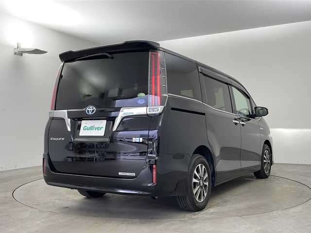 トヨタ エスクァイア ハイブリッド Gi 兵庫県 2018(平30)年 1.6万km ブラック ・純正9インチナビ（NSZT-Y68T）/CD/DVD/SD/Bluetooth/TV/・バックカメラ/・ビルトインETC/・純正ドライブレコーダー/・合成皮革シート/・前席シートヒーター/・両側パワースライドドア/・クルーズコントロール/・Toyota　Safety　Sense/・プリクラッシュセーフティ/・レーンディパーチャーアラート/・オートマチックハイビーム/・先行車発進告知機能/・純正ウッドコンビステアリング/・ＬＥＤヘッドライト/・ＬＥＤフォグランプ/・スマートキー/・プッシュスタート/・TRC