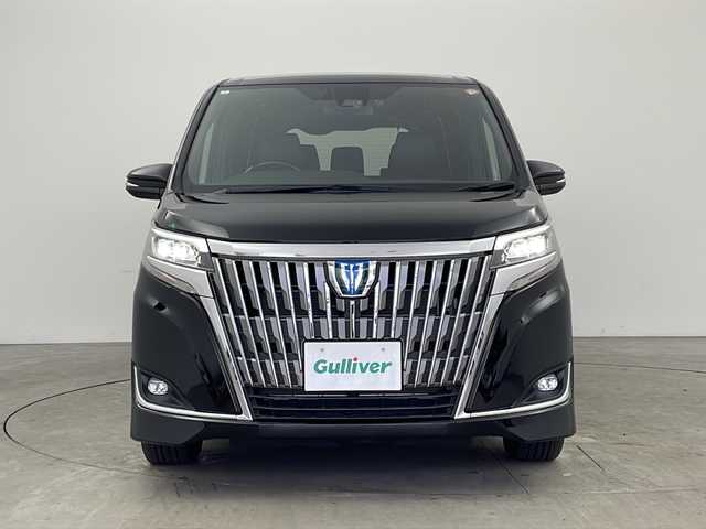 トヨタ エスクァイア ハイブリッド Gi 兵庫県 2018(平30)年 1.6万km ブラック ・純正9インチナビ（NSZT-Y68T）/CD/DVD/SD/Bluetooth/TV/・バックカメラ/・ビルトインETC/・純正ドライブレコーダー/・合成皮革シート/・前席シートヒーター/・両側パワースライドドア/・クルーズコントロール/・Toyota　Safety　Sense/・プリクラッシュセーフティ/・レーンディパーチャーアラート/・オートマチックハイビーム/・先行車発進告知機能/・純正ウッドコンビステアリング/・ＬＥＤヘッドライト/・ＬＥＤフォグランプ/・スマートキー/・プッシュスタート/・TRC