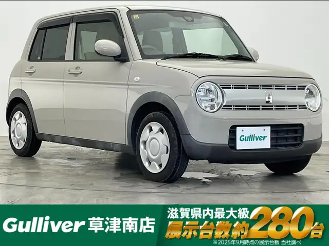 スズキ ラパン G 滋賀県 2016(平28)年 4.9万km フォーンベージュM 純正7インチナビ/【Bluetooth/CD/DVD/フルセグTV/USB】/衝突軽減ブレーキ/MTモード付AT/プッシュスタート/スマートキー/ABS/横滑り防止装置