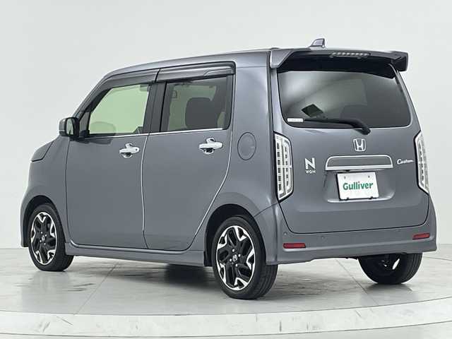 ホンダ Ｎ ＷＧＮ カスタム Lターボ ホンダS 大阪府 2021(令3)年 2.5万km シャイニンググレーM Honda SENSING/・衝突軽減ブレーキ/・誤発進抑制機能/・後方誤発進抑制機能/・車線維持支援システム/・渋滞追従機能付アダプティブクルーズコントロール/・標識認識機能/・オートハイビーム/純正ナビ/　CD/DVD/BT/フルセグTV/バックカメラ/LEDオートライト/フォグランプ/ハーフレザーシート/D席シートヒーター/純正15インチアルミホイール/パドルシフト/後方コーナーセンサー/スマートキー/ビルトインETC/電動格納ウィンカーミラー/純正フロアマット/ドアバイザー/ISOFIX