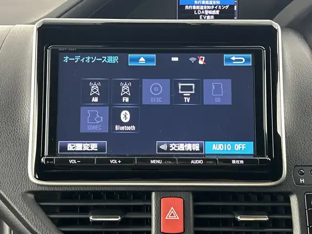 トヨタ ノア ハイブリッド Si ダブルバイビー 愛知県 2018(平30)年 5.2万km ホワイトパールクリスタルシャイン 禁煙車/純正9インチSDナビ/　（フルセグTV/CD/DVD/SD/Bluetooth）/バックカメラ/トヨタセーフティセンス/・プリクラッシュセーフティ/・レーンキープアシスト/・オートマチックハイビーム/・先行車発信お知らせ機能/クルーズコントロール/ETC/ドライブレコーダー/前席シートヒーター/両側パワースライドドア/純正16インチアルミホイール/LEDヘッドライト/フロントフォグランプ/横滑り防止機能/純正フロアマット/純正ドアバイザー/スマートキー/スペアキー有