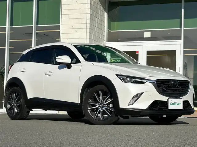 マツダ ＣＸ－３ 兵庫県 2017(平29)年 6.9万km スノーフレイクホワイトパールマイカ 純正SDナビ/BT/フルセグ/ETC/バックカメラ/追従クルーズコントロール/ヘッドアップディスプレイ/ハーフレザーシート/USB端子/革巻ステアリング/パドルシフト/オートライト/LEDヘッドライト/ウィンカーミラー/トノカバー