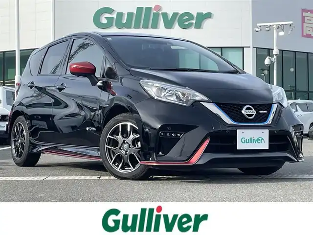 日産 ノート e－パワー ニスモ 佐賀県 2018(平30)年 6万km スーパーブラック NISMOエアロ/純正SDナビゲーション/・フルセグTV/CD/DVD/Bluetooth/アラウンドビューモニター/ドライブレコーダー一体型インテリジェントルームミラー/ETC/革巻きステアリング/ステアリングリモコン/スマートキー×2/プッシュスタート/純正16インチアルミホイール/純正LEDヘッドライト/純正フォグランプ/純正フロアマット/インテリジェントエマージェンシーブレーキ/・踏み間違い衝突防止アシスト/・LDW（車線逸脱警報）/・ハイビームアシスト/・標識検知機能/・ヒルスタートアシスト/・インテリジェントDA（ふらつき警報）