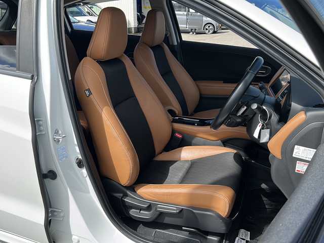 ホンダ ヴェゼル ハイブリッド Z ホンダセンシング 富山県 2018(平30)年 7.4万km プラチナホワイトパール 禁煙車/ワンオーナー　/純正ＨＤＤナビ　/フルセグ　/ホンダセンシング　/バックカメラ　/ＬＥＤヘッドライト　/レーダークルーズコントロール　/パドルシフト　/スマートキー　/ハーフレザーシート　/純正アルミホイール　/純正オーディオ/ウィンカーミラー/電動格納ミラー/ビルトインETC/プッシュスタート
