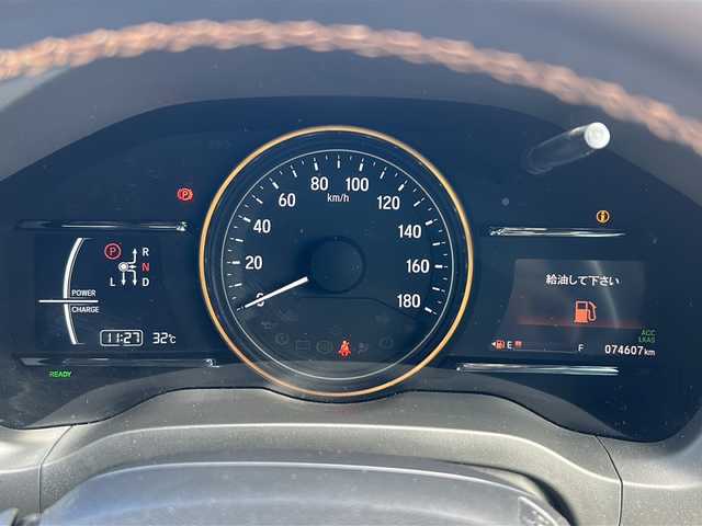 ホンダ ヴェゼル ハイブリッド Z ホンダセンシング 富山県 2018(平30)年 7.4万km プラチナホワイトパール 禁煙車/ワンオーナー　/純正ＨＤＤナビ　/フルセグ　/ホンダセンシング　/バックカメラ　/ＬＥＤヘッドライト　/レーダークルーズコントロール　/パドルシフト　/スマートキー　/ハーフレザーシート　/純正アルミホイール　/純正オーディオ/ウィンカーミラー/電動格納ミラー/ビルトインETC/プッシュスタート