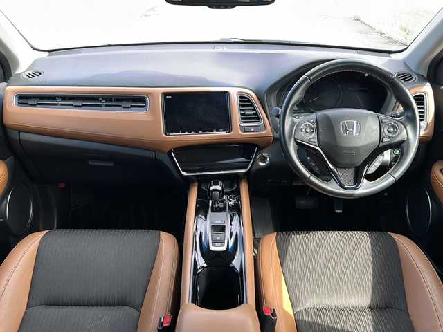 ホンダ ヴェゼル ハイブリッド Z ホンダセンシング 富山県 2018(平30)年 7.4万km プラチナホワイトパール 禁煙車/ワンオーナー　/純正ＨＤＤナビ　/フルセグ　/ホンダセンシング　/バックカメラ　/ＬＥＤヘッドライト　/レーダークルーズコントロール　/パドルシフト　/スマートキー　/ハーフレザーシート　/純正アルミホイール　/純正オーディオ/ウィンカーミラー/電動格納ミラー/ビルトインETC/プッシュスタート
