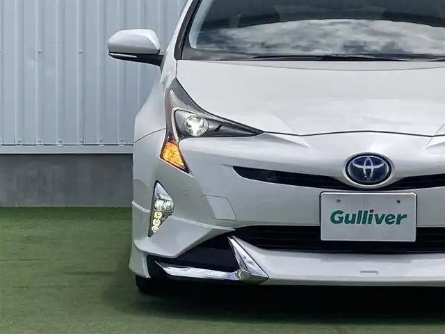トヨタ プリウス A 香川県 2016(平28)年 5万km ホワイトパールクリスタルシャイン 登録時走行距離：49473km/エクリプスSDナビ/　CD DVD BT フルセグTV/バックカメラ/エアロ（フロント・サイド・リアアンダー）/プリクラッシュセーフティシステム/レーンキープアシスト/レーダークルーズコントロール/クリアランスソナー/パーキングアシスト/ブラインドスポットモニター/ヘッドアップディスプレイ/オートハイビーム/オートライト/フォグランプ/横滑り防止装置/ETC/PWオールオート/ドアロック連動式オートリトラクタブルドアミラー/電動格納ウィンカーミラー/ドアバイザー/純正フロアマット/ISOFIX/ETC/革巻きステアリング/ステアリングスイッチ/プッシュスタート/スマートキー