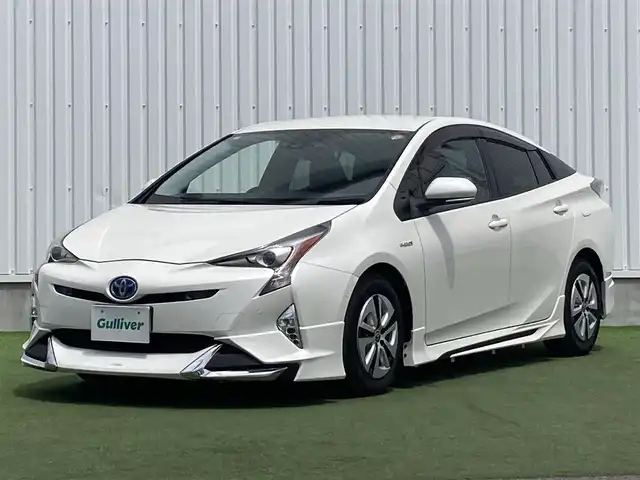 トヨタ プリウス A 香川県 2016(平28)年 5万km ホワイトパールクリスタルシャイン 登録時走行距離：49473km/エクリプスSDナビ/　CD DVD BT フルセグTV/バックカメラ/エアロ（フロント・サイド・リアアンダー）/プリクラッシュセーフティシステム/レーンキープアシスト/レーダークルーズコントロール/クリアランスソナー/パーキングアシスト/ブラインドスポットモニター/ヘッドアップディスプレイ/オートハイビーム/オートライト/フォグランプ/横滑り防止装置/ETC/PWオールオート/ドアロック連動式オートリトラクタブルドアミラー/電動格納ウィンカーミラー/ドアバイザー/純正フロアマット/ISOFIX/ETC/革巻きステアリング/ステアリングスイッチ/プッシュスタート/スマートキー