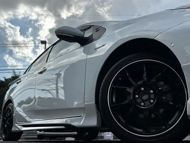 トヨタ プリウス A プレミアム　ツーリングセレ 熊本県 2016(平28)年 9.2万km ホワイトパールクリスタルシャイン フルエアロ/4WD/純正9インチナビ（DSZT-YC4T）/【フルセグTV／CD／DVD/BT】/バックカメラ　/レーダークルーズコントロール/プリクラッシュセーフティ/レーンキープアシスト/オートLEDヘッドライト　/オートハイビーム/黒革シート/D席パワーシート/前席シートヒーター/社外17インチAW/ETC/ドライブレコーダー　/オートエアコン