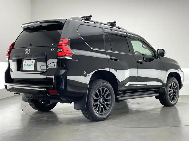 トヨタ ランドクルーザー プラド TX Lパッケージ マットブラED 愛知県 2022(令4)年 1.3万km ブラック メーカーナビＴＶ　ムーンルーフ　禁煙車　全方位カメラ　ＢＳＭ　黒革　シートヒーター　シートエアコン　コーナーセンサー　セーフティセンス　衝突軽減　追従クルコン　純正ルーフレール　ETC　7人　　ＬＥＤライト　ヘッドライトウォッシャー　ETC２．０　オートハイビーム　ルーフレール　スペアタイヤ