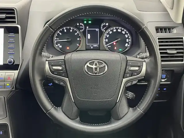 トヨタ ランドクルーザー プラド TX Lパッケージ マットブラED 愛知県 2022(令4)年 1.3万km ブラック メーカーナビＴＶ　ムーンルーフ　禁煙車　全方位カメラ　ＢＳＭ　黒革　シートヒーター　シートエアコン　コーナーセンサー　セーフティセンス　衝突軽減　追従クルコン　純正ルーフレール　ETC　7人　　ＬＥＤライト　ヘッドライトウォッシャー　ETC２．０　オートハイビーム　ルーフレール　スペアタイヤ