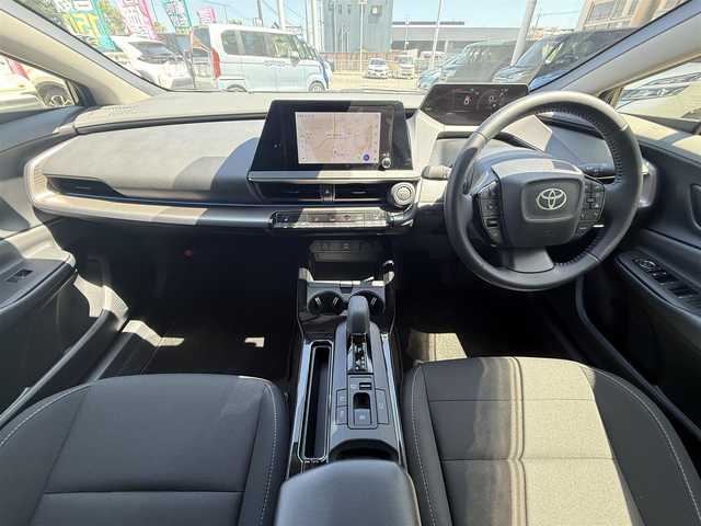 トヨタ プリウス G 千葉県 2025(令7)年 0.5万km アティチュードブラックマイカ 純正8インチディスプレイオーディオ/フルセグ/Bluetooth/USB/レーダークルーズコントロール/ビルトインETC2.0/前席シートヒーター/電動パーキングブレーキ/レーンアシスト/LEDヘッドライト/オートライト/オートハイビーム/純正19インチアルミホイール/純正フロアマット