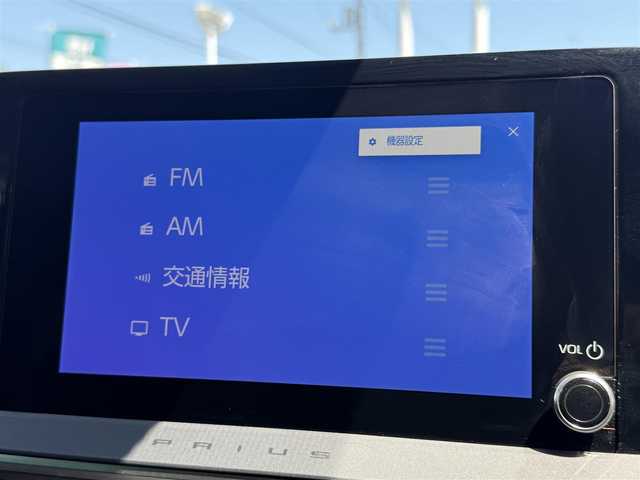 トヨタ プリウス G 千葉県 2025(令7)年 0.5万km アティチュードブラックマイカ 純正8インチディスプレイオーディオ/フルセグ/Bluetooth/USB/レーダークルーズコントロール/ビルトインETC2.0/前席シートヒーター/電動パーキングブレーキ/レーンアシスト/LEDヘッドライト/オートライト/オートハイビーム/純正19インチアルミホイール/純正フロアマット