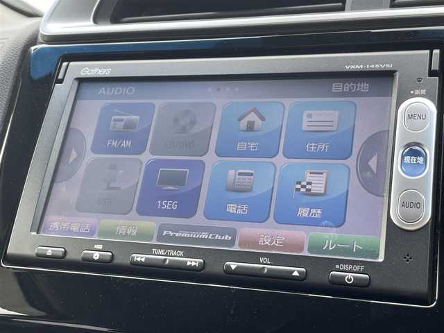 ホンダ フィット ハイブリット Fパッケージ 愛媛県 2014(平26)年 5.6万km プレミアムホワイトパール バックカメラ/LED/オートライト/Bluetooth/USB/カーテンエアバッグ/純正フロアマット/スマートキー/ワンセグTV/プッシュスタート/パワーステアリング/パワーウィンドウ/AAC/CD/SDナビ/DVD/ABS/横滑り防止装置/衝突被害軽減システム