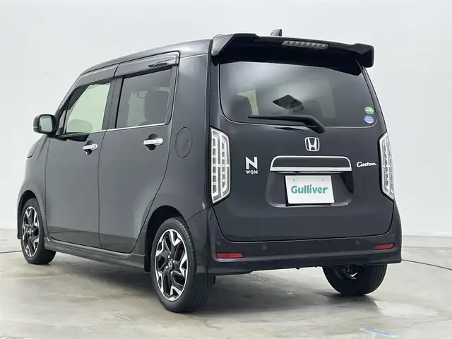 ホンダ Ｎ ＷＧＮ カスタム Lターボ ホンダS 岡山県 2020(令2)年 6万km クリスタルブラックパール 純正8型ナビ/・FM/AM/Bluetooth/フルセグ/CD/DVD/バックカメラ/ハーフレザーシート/・シートヒーター/ホンダセンシング/・衝突軽減ブレーキ/・車線逸脱警報/・アダプティブクルーズコントロール/・バックソナー/前後ドライブレコーダー/ビルトインETC/パドルシフト/LEDヘッドライト/・フォグライト/ドアバイザー/純正フロアマット/純正15インチアルミ