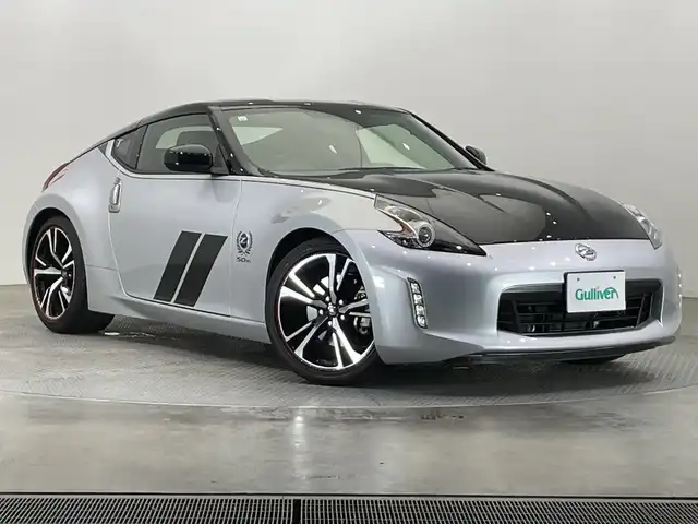 日産 フェアレディ Ｚ 50thアニバーサリー 栃木県 2019(令1)年 1.1万km ブリリアントシルバー/ダイヤモンドブラック 2トーン 純正ナビ/(フルセグTV・Bluetooth・CD・DVD・SD・AUX・USB)/バックカメラ/ハーフレザーシート/前席シートヒーター/HIDヘッドライト/オートライト/ビルトインETC/純正19インチアルミホイール/純正フロアマット/MTモード付AT/スマートキー/スペアキー1本/禁煙車/取扱説明書/保証書