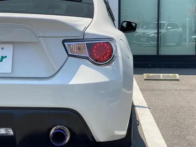 トヨタ ８６ GT 香川県 2015(平27)年 5.1万km クリスタルホワイトパール 純正SDナビ/→AM/FM/CD/DVD/Bluetooth/フルセグTV/バックカメラ/前後ドライブレコーダー/車高調/社外マフラー/社外18インチアルミホイール/HIDヘッドライト/パドルシフト/MTモード付AT/プッシュスタート/スマートキー/スペアキー×1