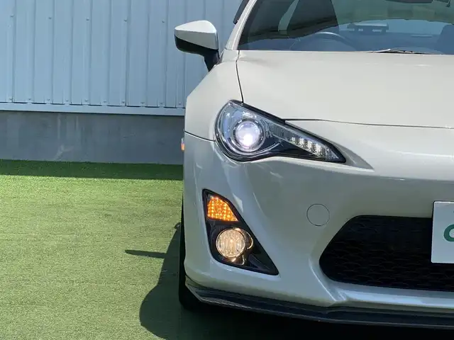 トヨタ ８６ GT 香川県 2015(平27)年 5.1万km クリスタルホワイトパール 純正SDナビ/→AM/FM/CD/DVD/Bluetooth/フルセグTV/バックカメラ/前後ドライブレコーダー/車高調/社外マフラー/社外18インチアルミホイール/HIDヘッドライト/パドルシフト/MTモード付AT/プッシュスタート/スマートキー/スペアキー×1