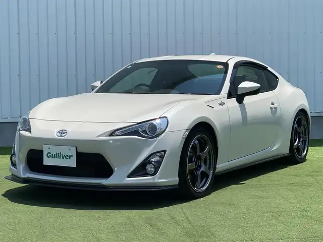 トヨタ ８６ GT 香川県 2015(平27)年 5.1万km クリスタルホワイトパール 純正SDナビ/→AM/FM/CD/DVD/Bluetooth/フルセグTV/バックカメラ/前後ドライブレコーダー/車高調/社外マフラー/社外18インチアルミホイール/HIDヘッドライト/パドルシフト/MTモード付AT/プッシュスタート/スマートキー/スペアキー×1